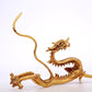 A Brilliant Pair Of Gilt-Bronze Dragons