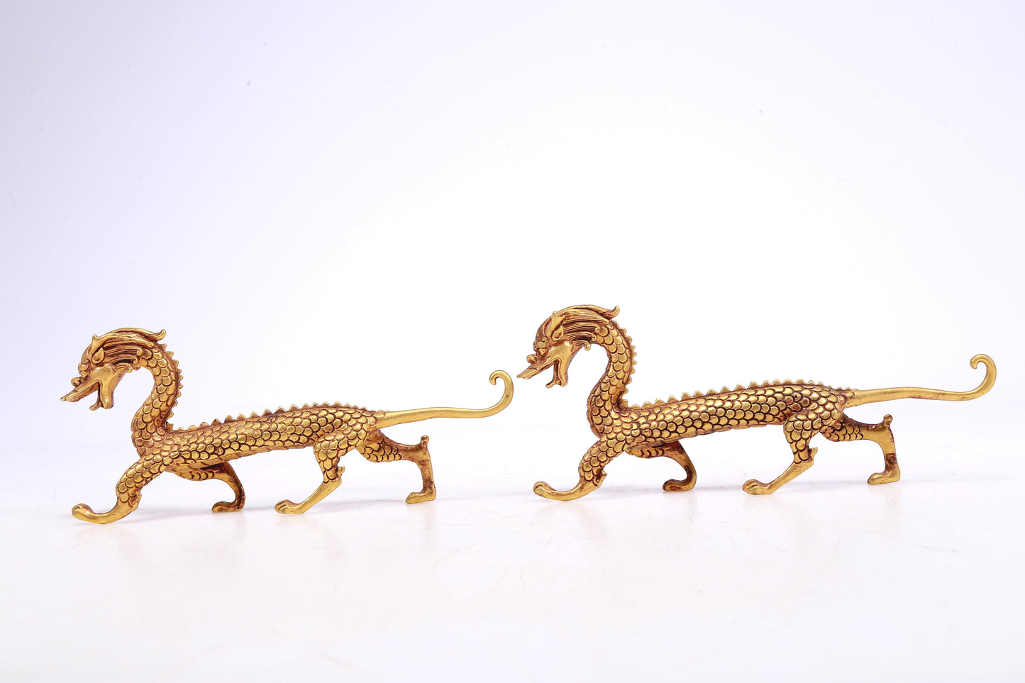 A Brilliant Pair Of Gilt-Bronze Dragons