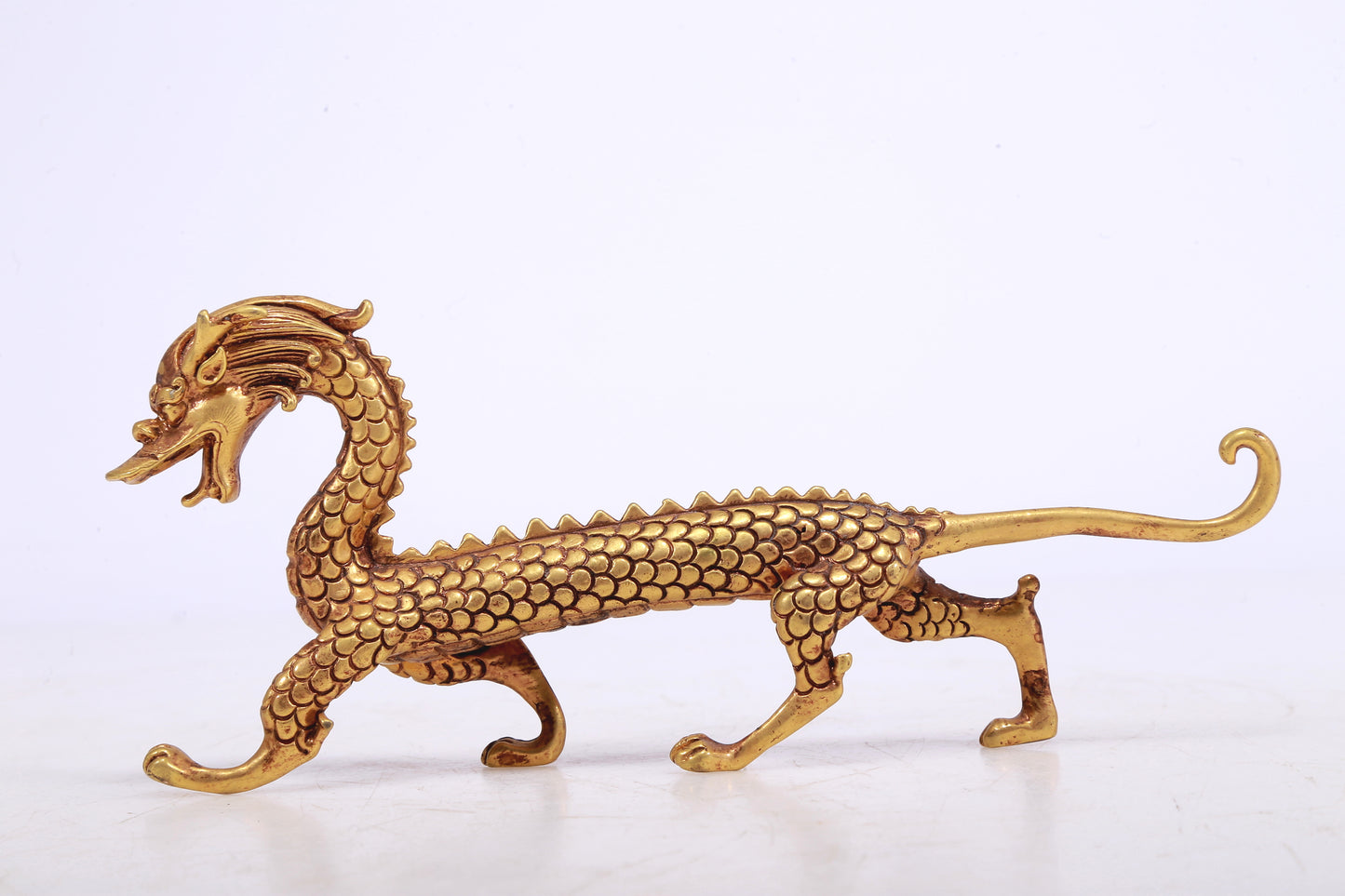 A Brilliant Pair Of Gilt-Bronze Dragons