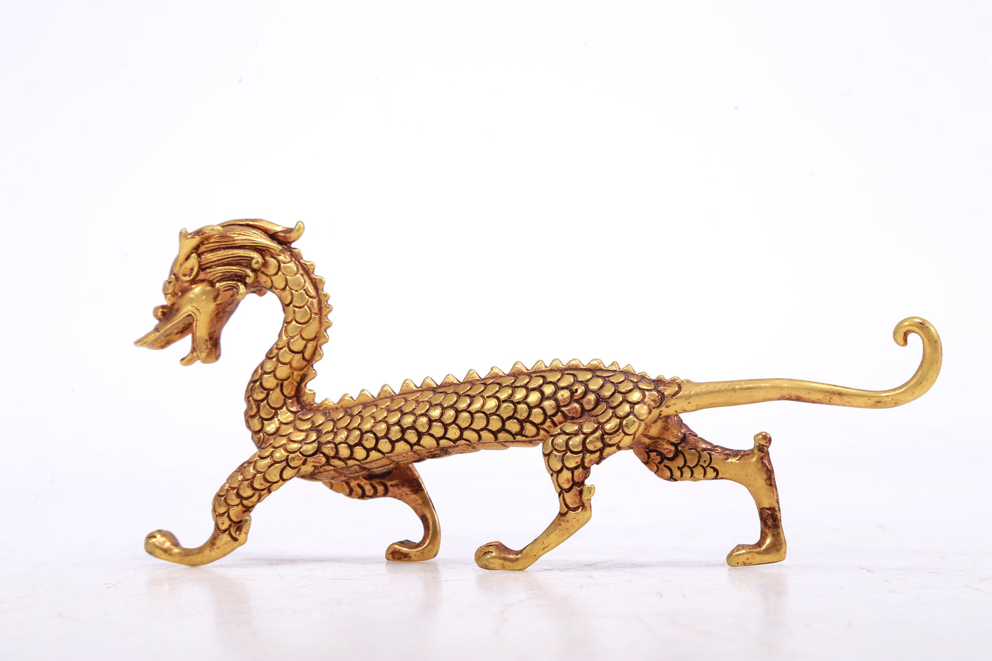 A Brilliant Pair Of Gilt-Bronze Dragons