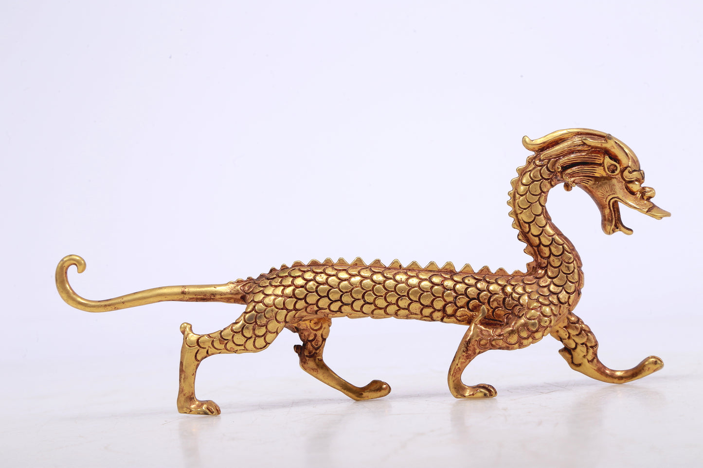 A Brilliant Pair Of Gilt-Bronze Dragons