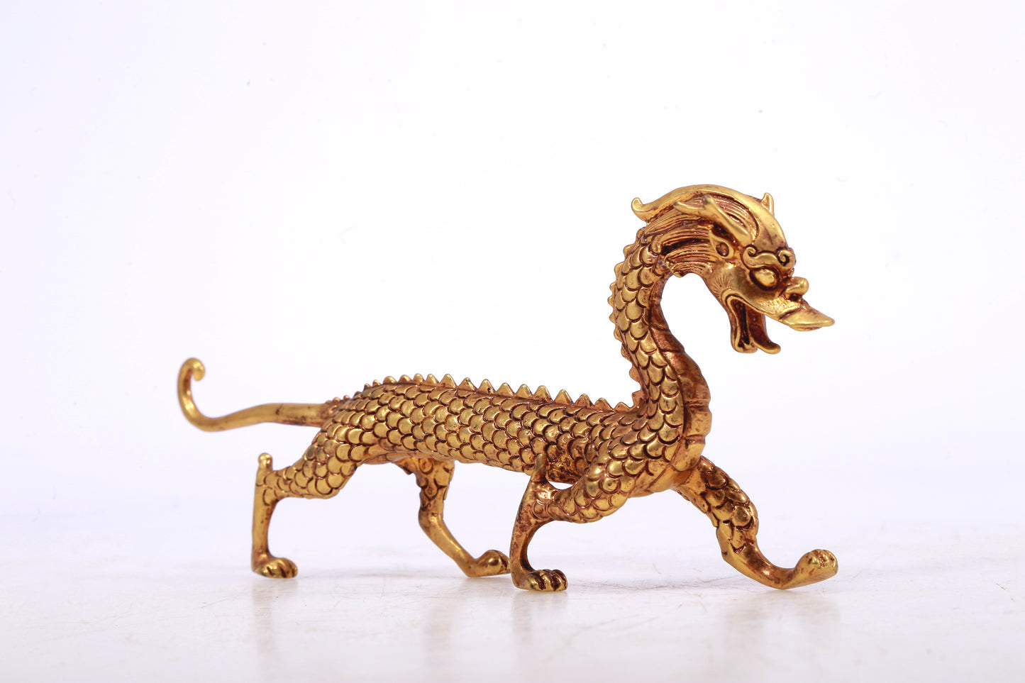 A Brilliant Pair Of Gilt-Bronze Dragons