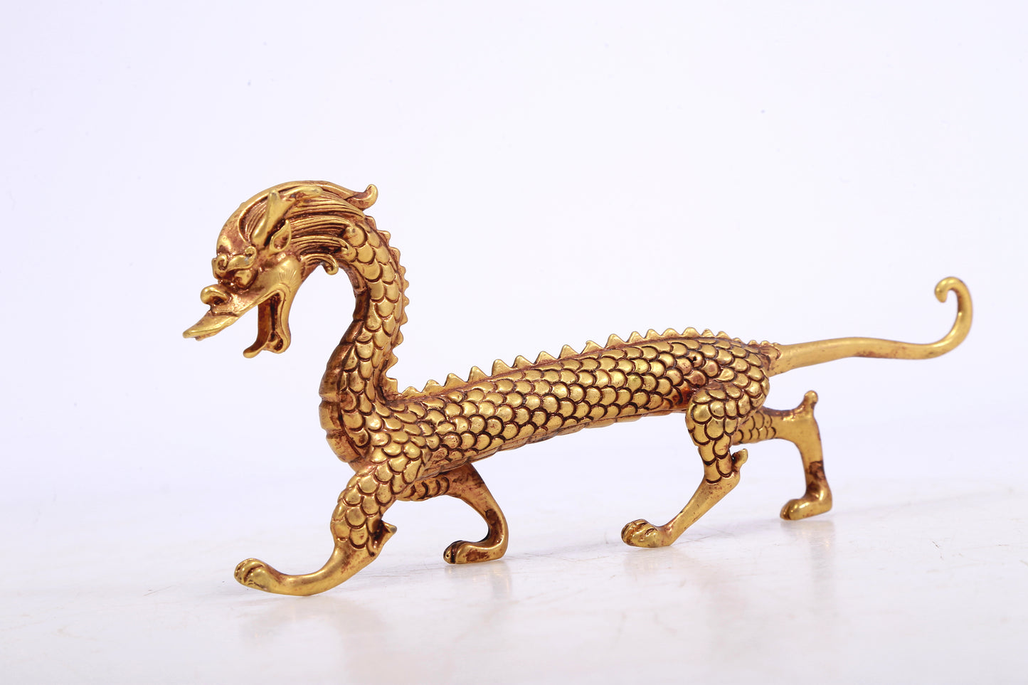 A Brilliant Pair Of Gilt-Bronze Dragons