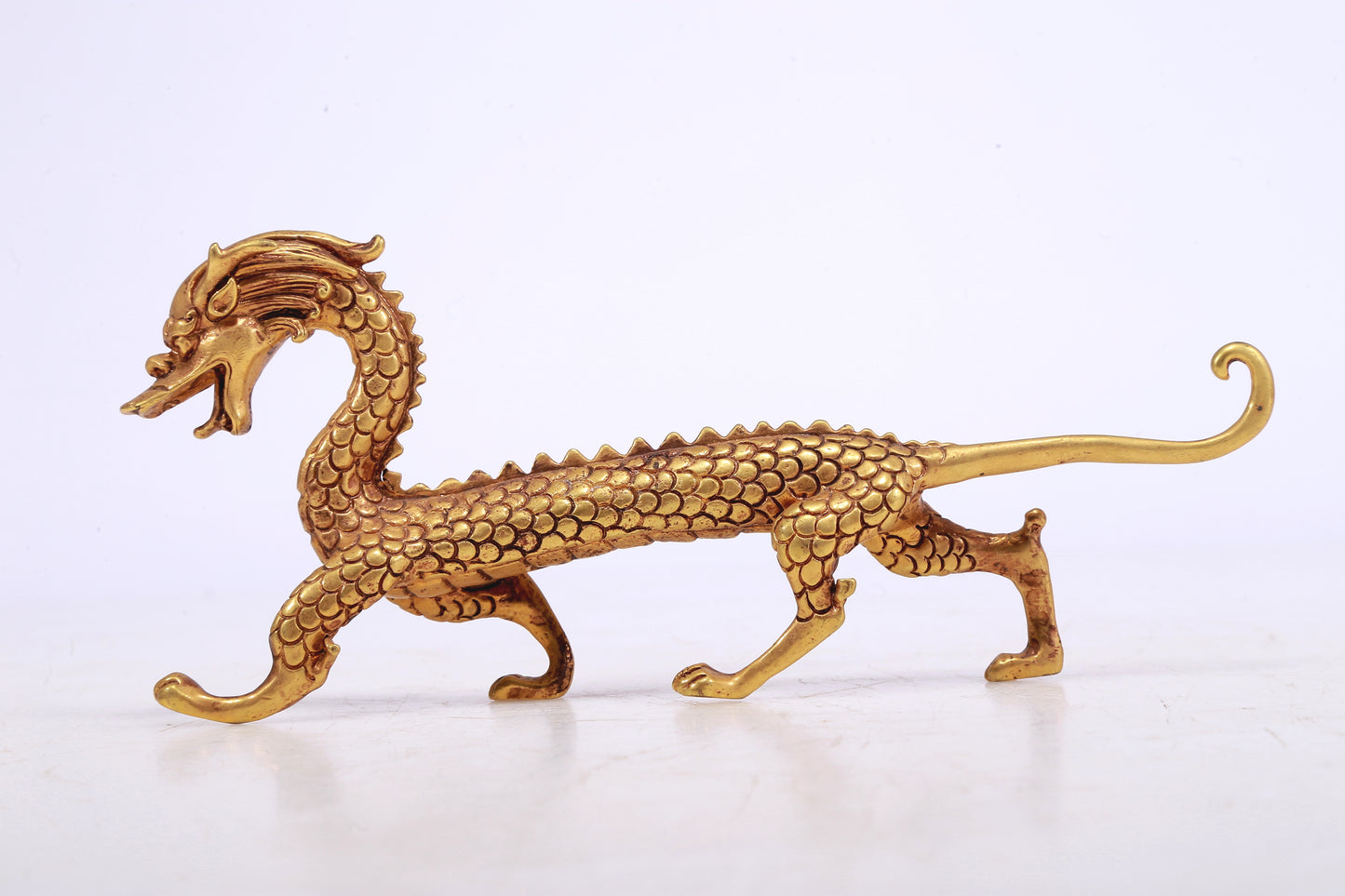 A Brilliant Pair Of Gilt-Bronze Dragons