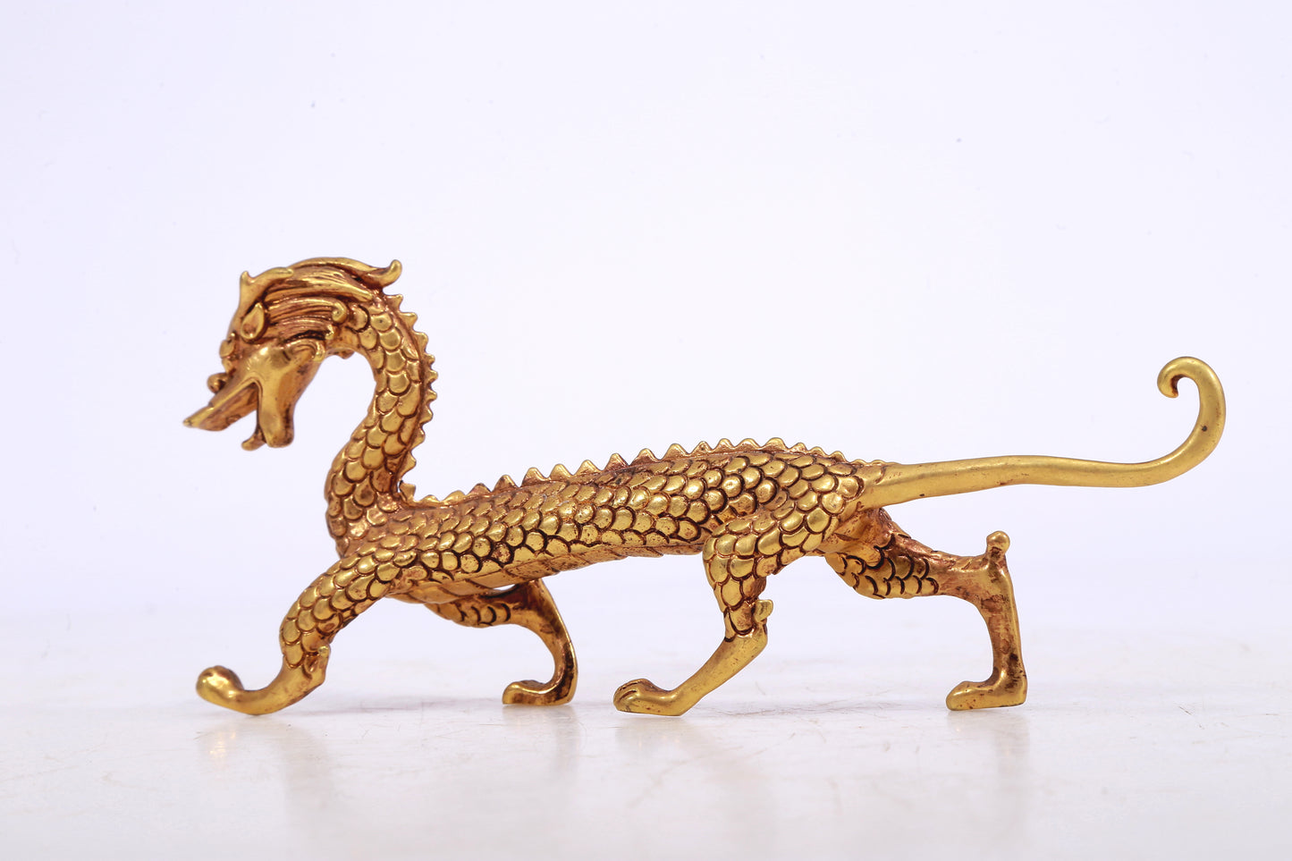 A Brilliant Pair Of Gilt-Bronze Dragons