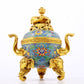 A perfect cloisonné elephant ear tripod censer with lid