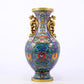 An exquisite cloisonné vase with lotus pattern and phoenix ears