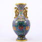 An exquisite cloisonné vase with lotus pattern and phoenix ears