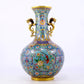 An exquisite cloisonne flower and bird pattern dragon ear vase