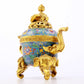 A perfect cloisonné elephant ear tripod censer with lid