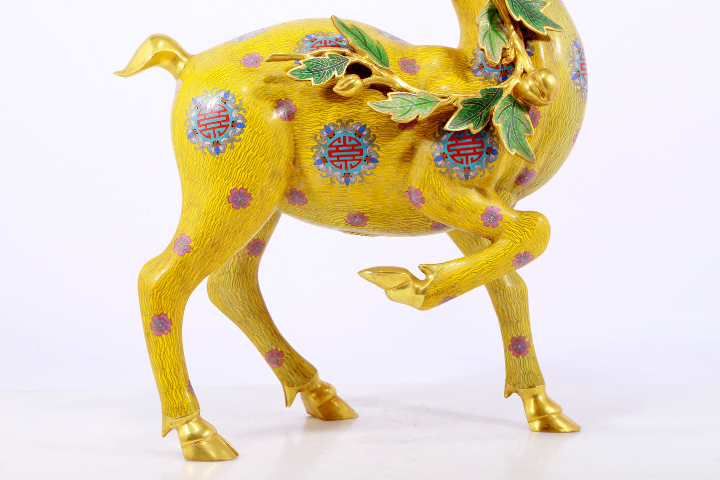 An exquisite cloisonné deer ornament