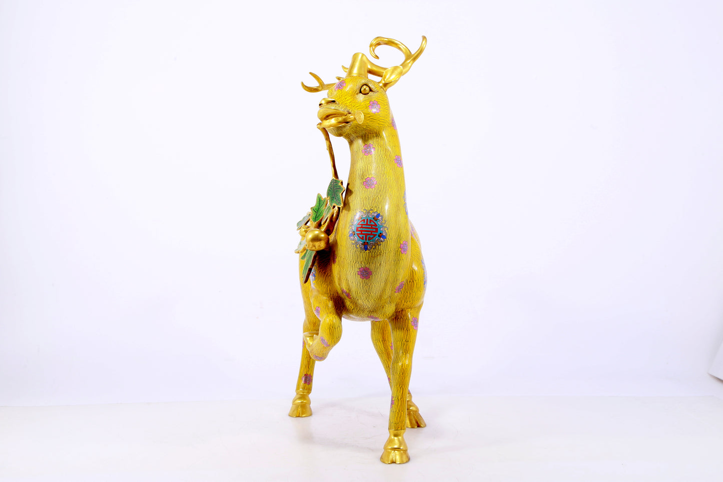 An exquisite cloisonné deer ornament