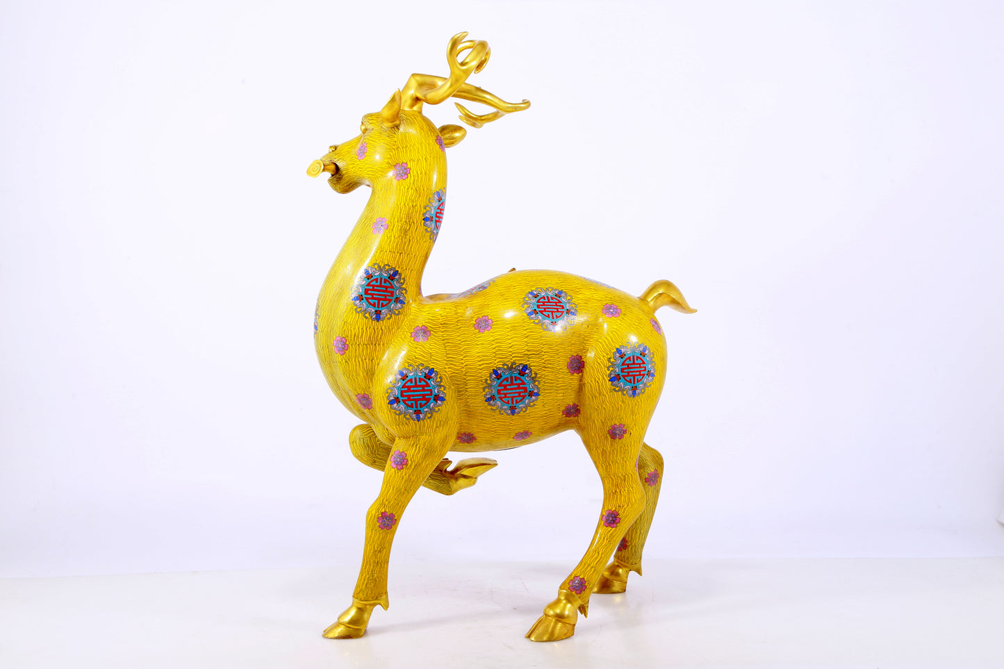 An exquisite cloisonné deer ornament