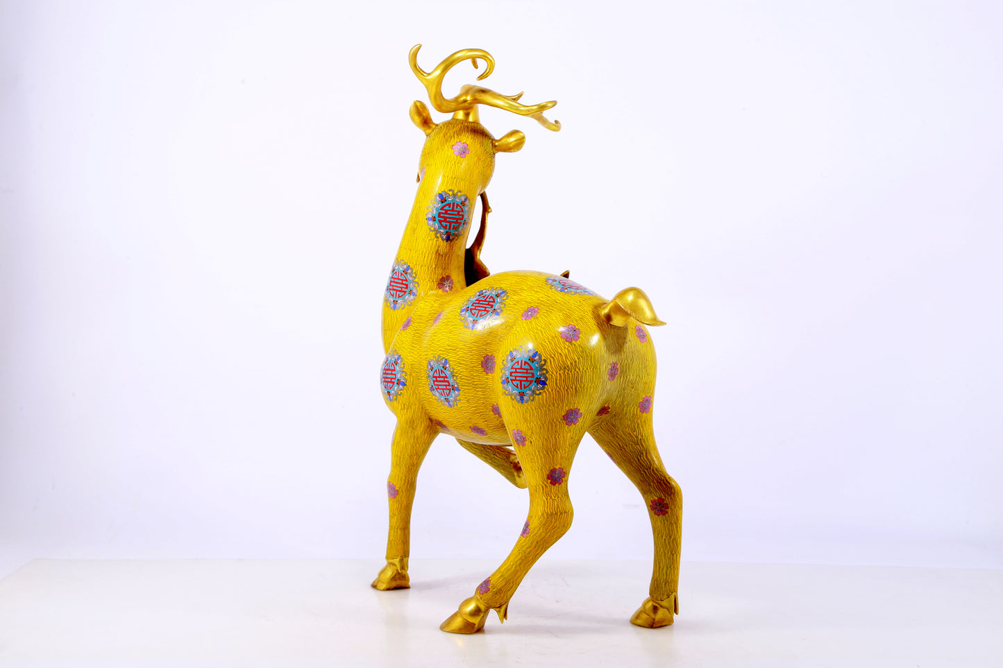 An exquisite cloisonné deer ornament