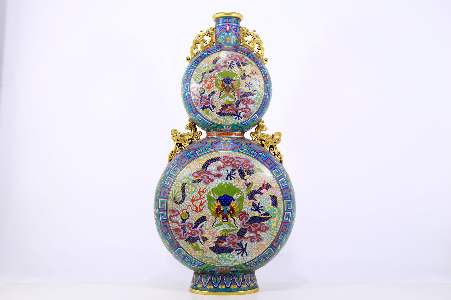 An exquisite cloisonne 'auspicious clouds and dragon' pattern gourd-shaped amphorae