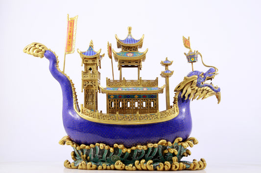 A stunning cloisonné dragon boat ornament