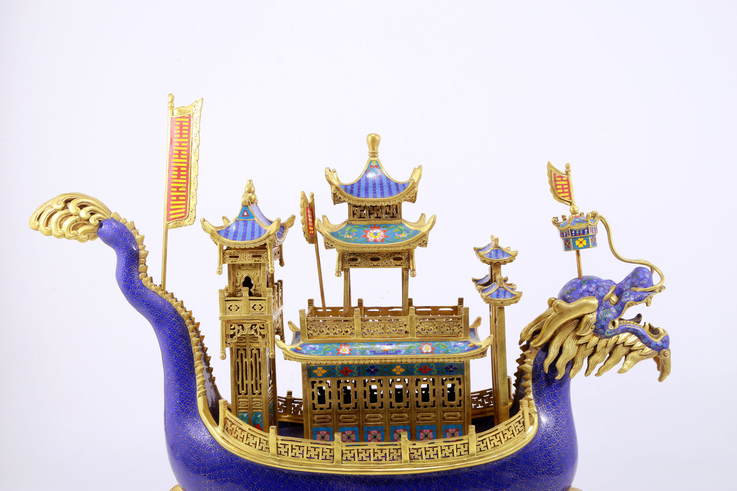 A stunning cloisonné dragon boat ornament