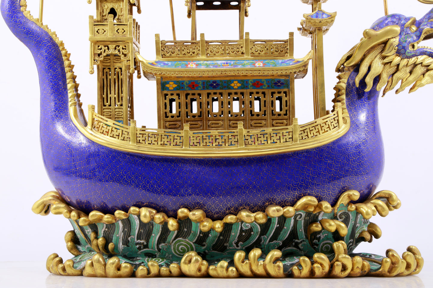 A stunning cloisonné dragon boat ornament