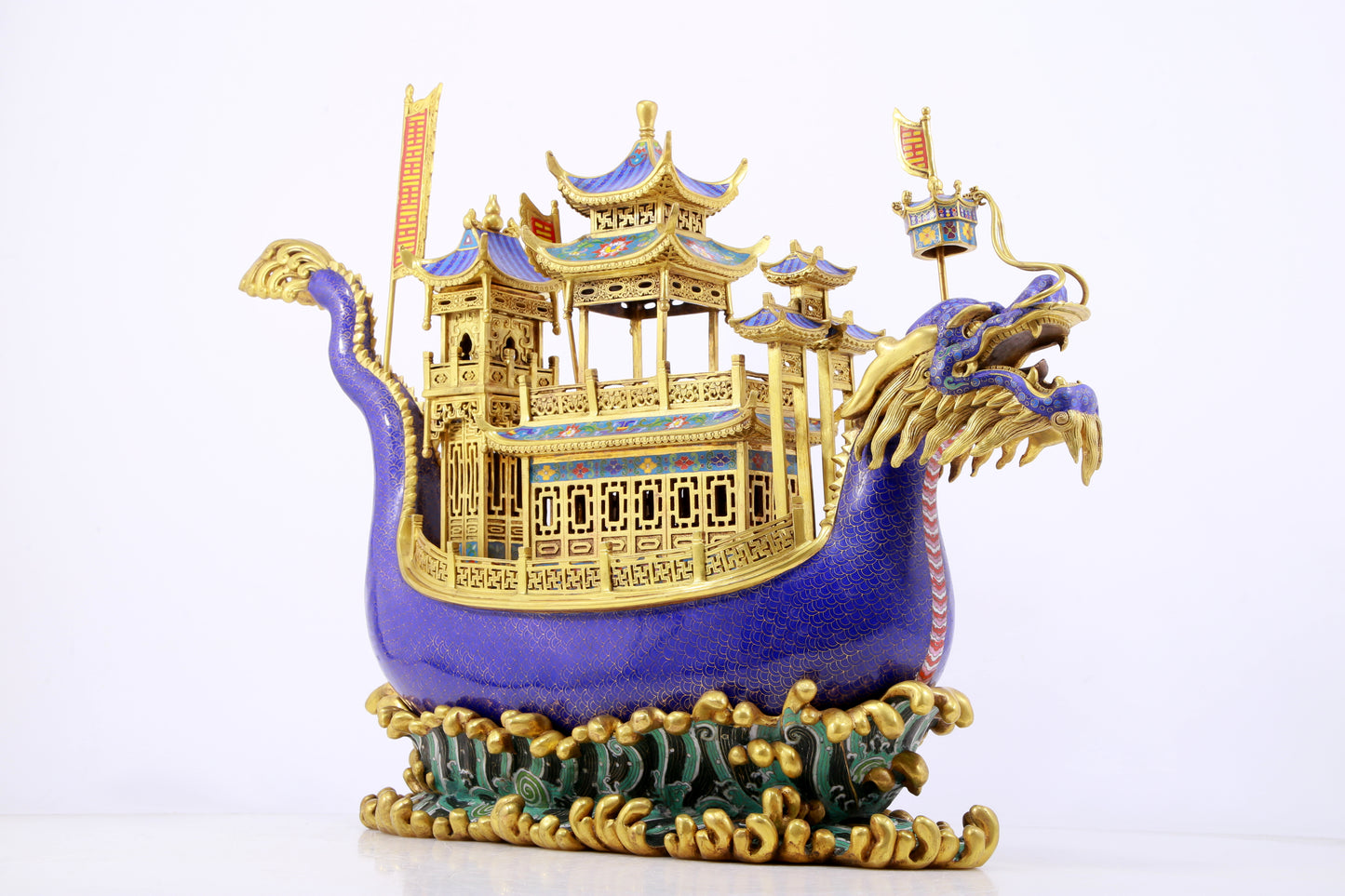 A stunning cloisonné dragon boat ornament