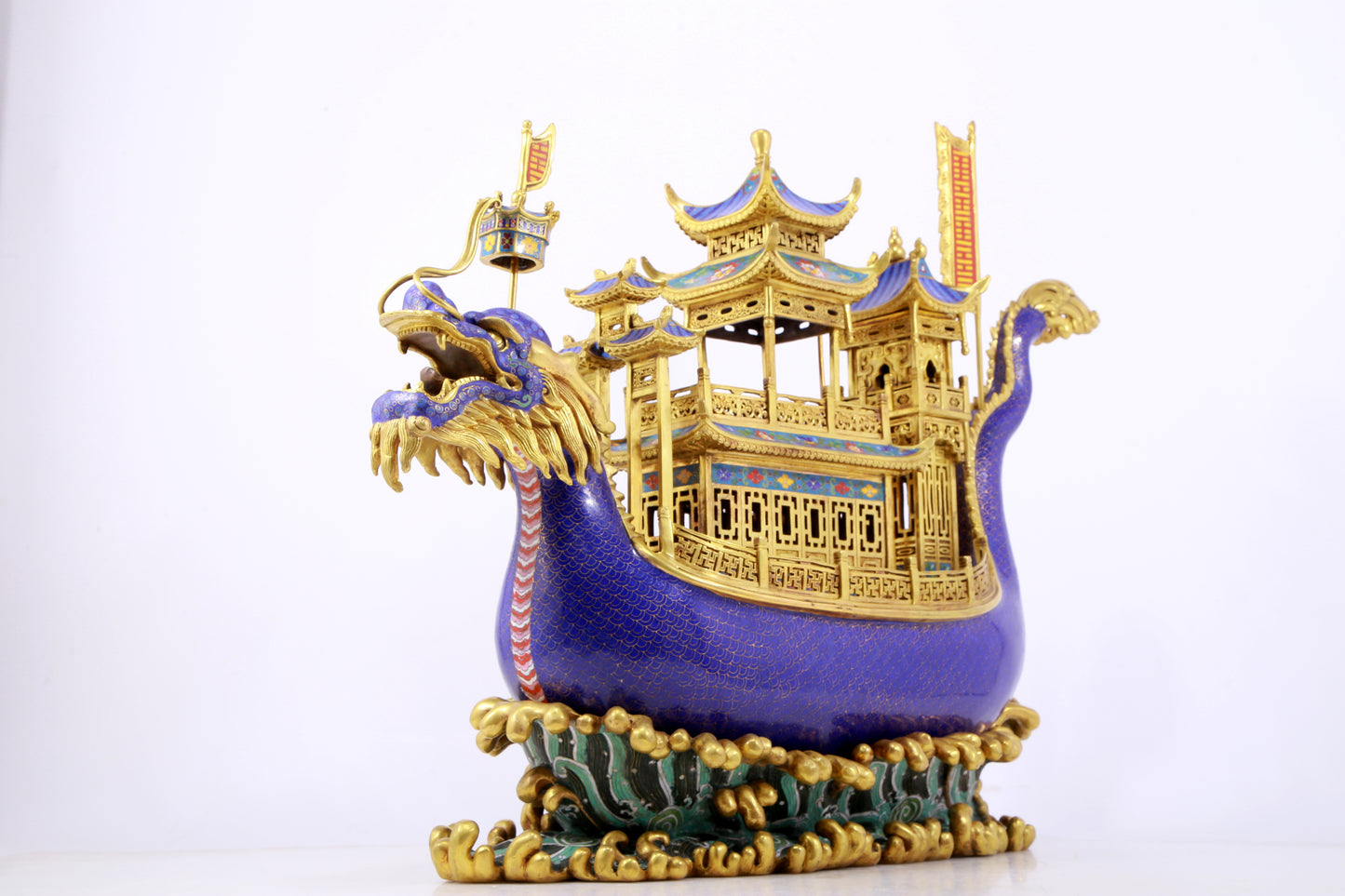 A stunning cloisonné dragon boat ornament