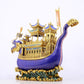 A stunning cloisonné dragon boat ornament