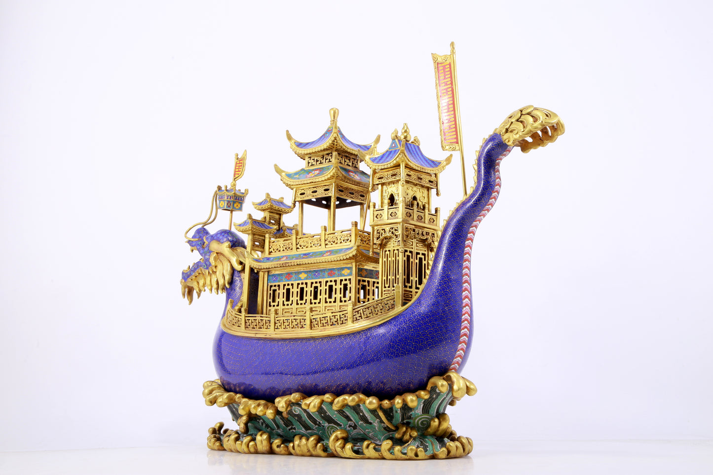 A stunning cloisonné dragon boat ornament