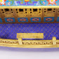 A stunning cloisonné dragon boat ornament