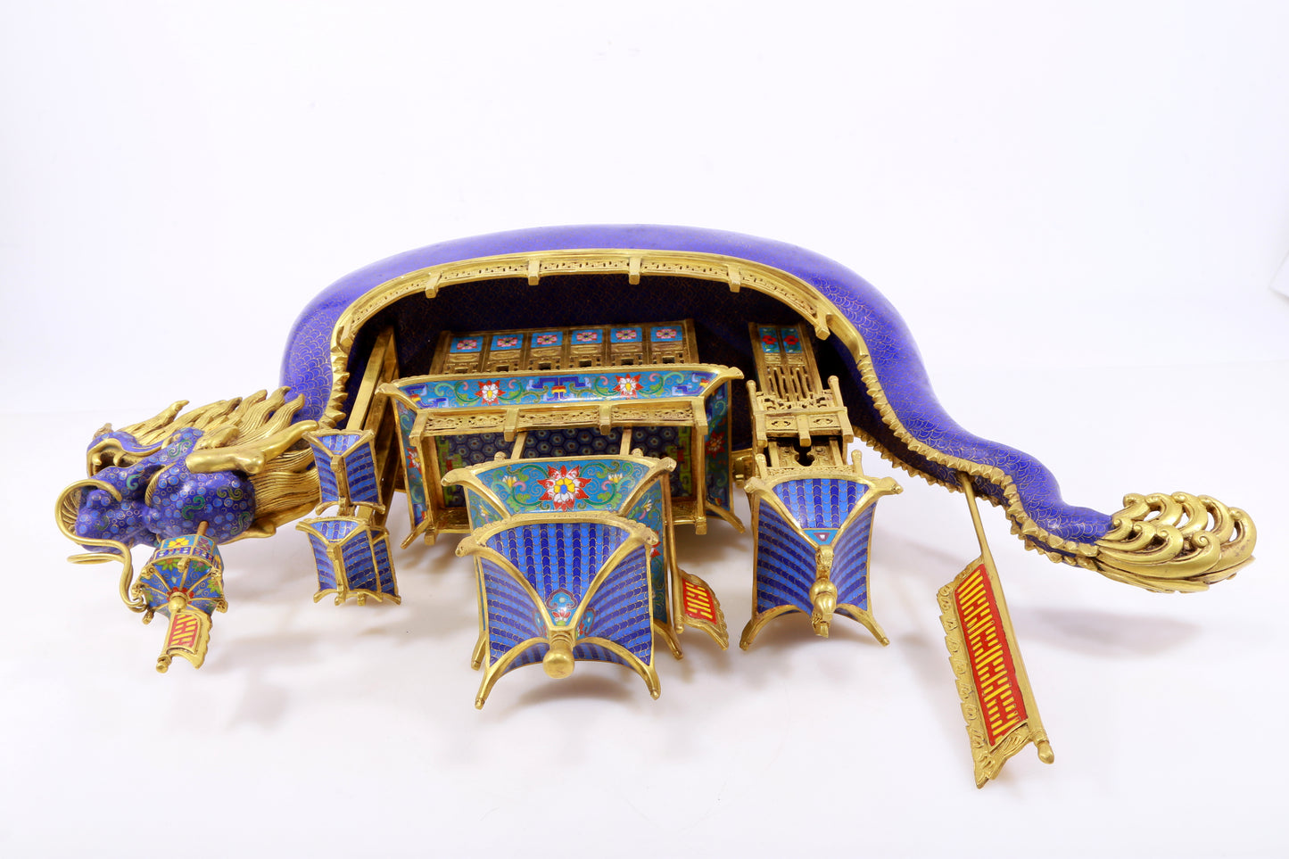 A stunning cloisonné dragon boat ornament