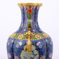 A stunning cloisonné vase with flower and bird patterns