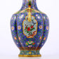 A stunning cloisonné vase with flower and bird patterns