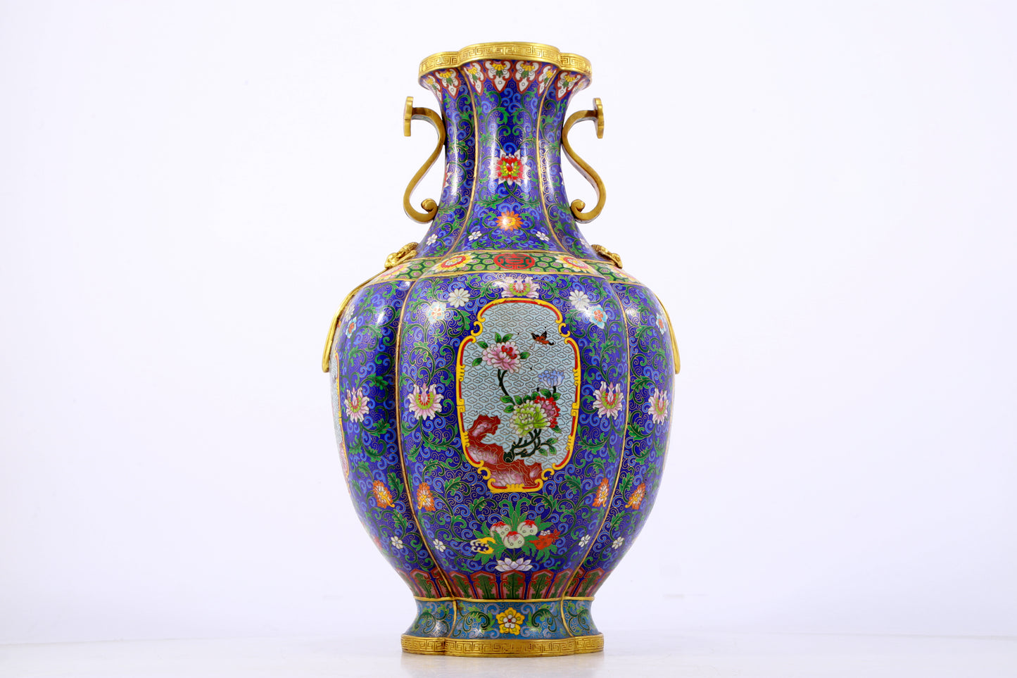 A stunning cloisonné vase with flower and bird patterns