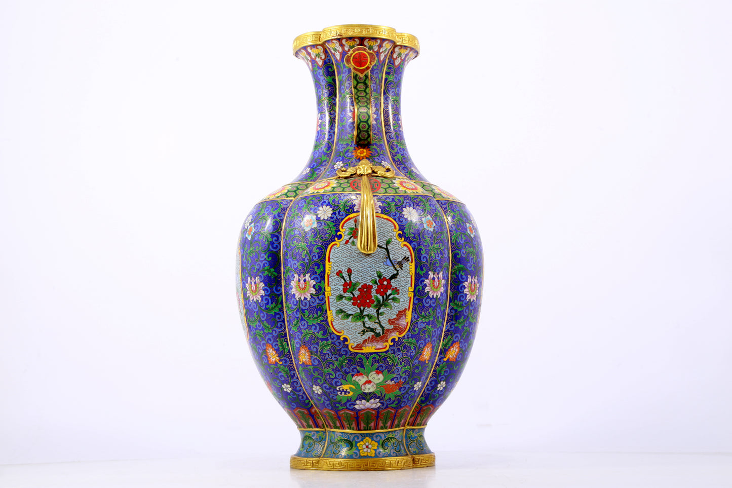 A stunning cloisonné vase with flower and bird patterns