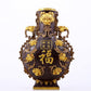 An exquisite gilt copper amphora with floral and auspicious animal patterns