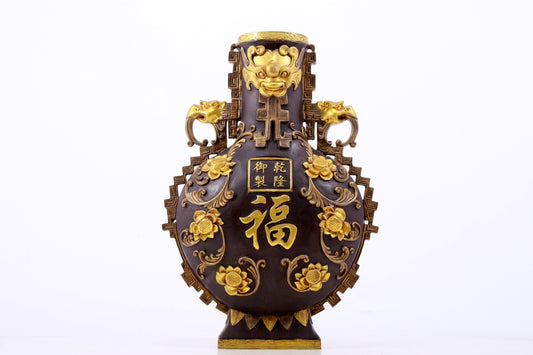 An exquisite gilt copper amphora with floral and auspicious animal patterns