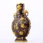 An exquisite gilt copper amphora with floral and auspicious animal patterns