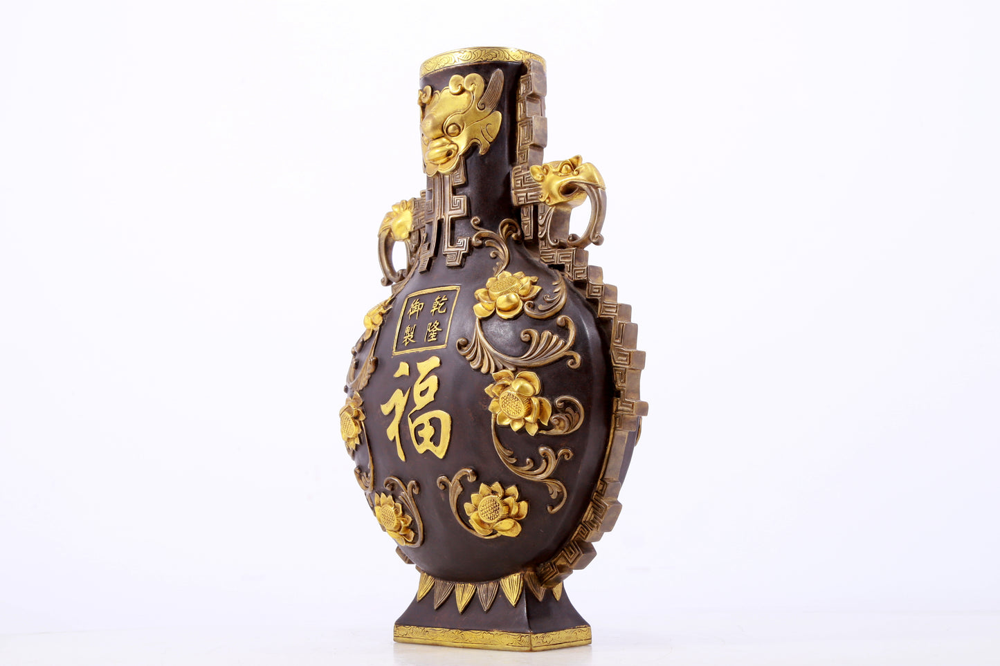 An exquisite gilt copper amphora with floral and auspicious animal patterns