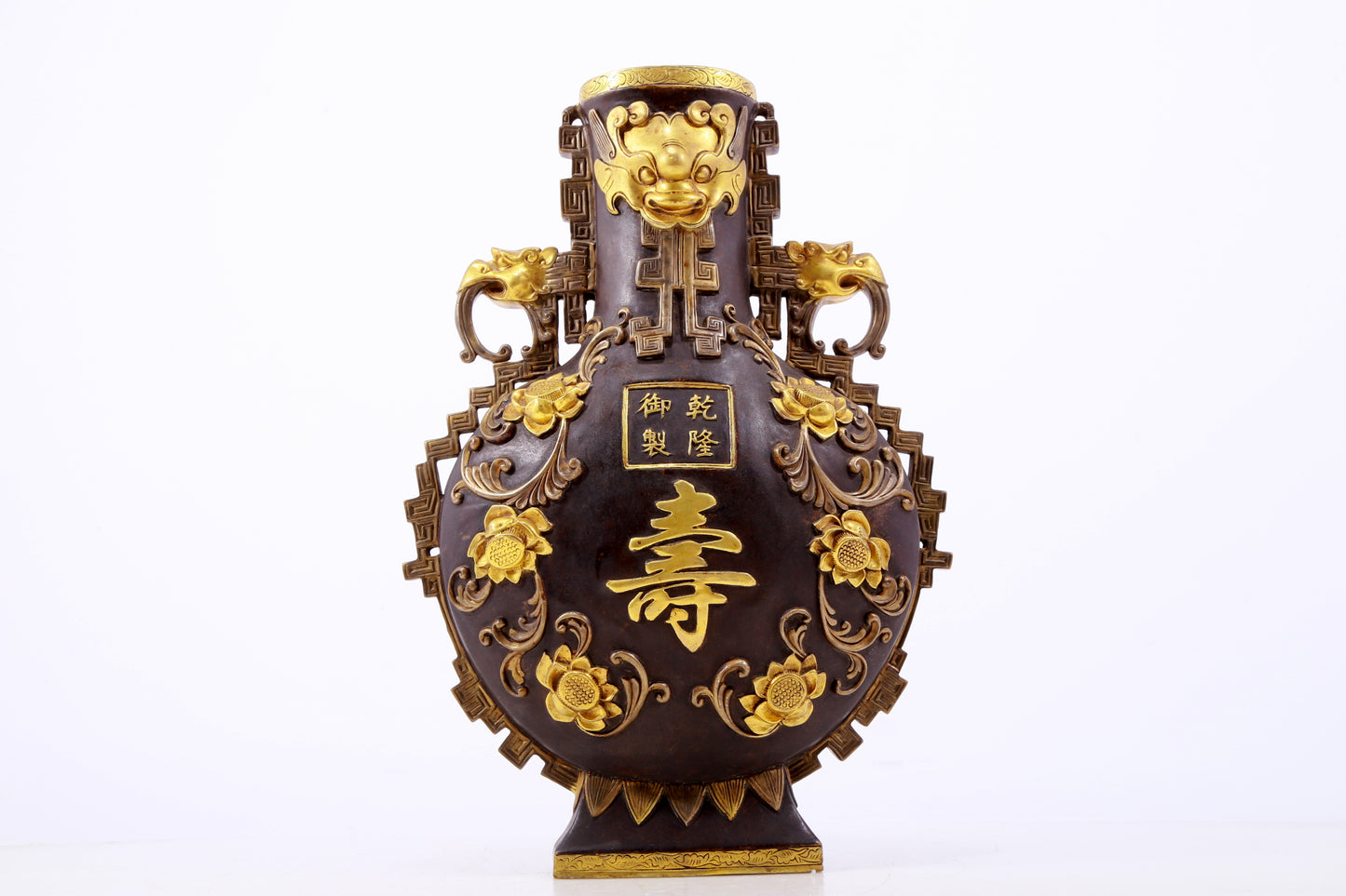 An exquisite gilt copper amphora with floral and auspicious animal patterns