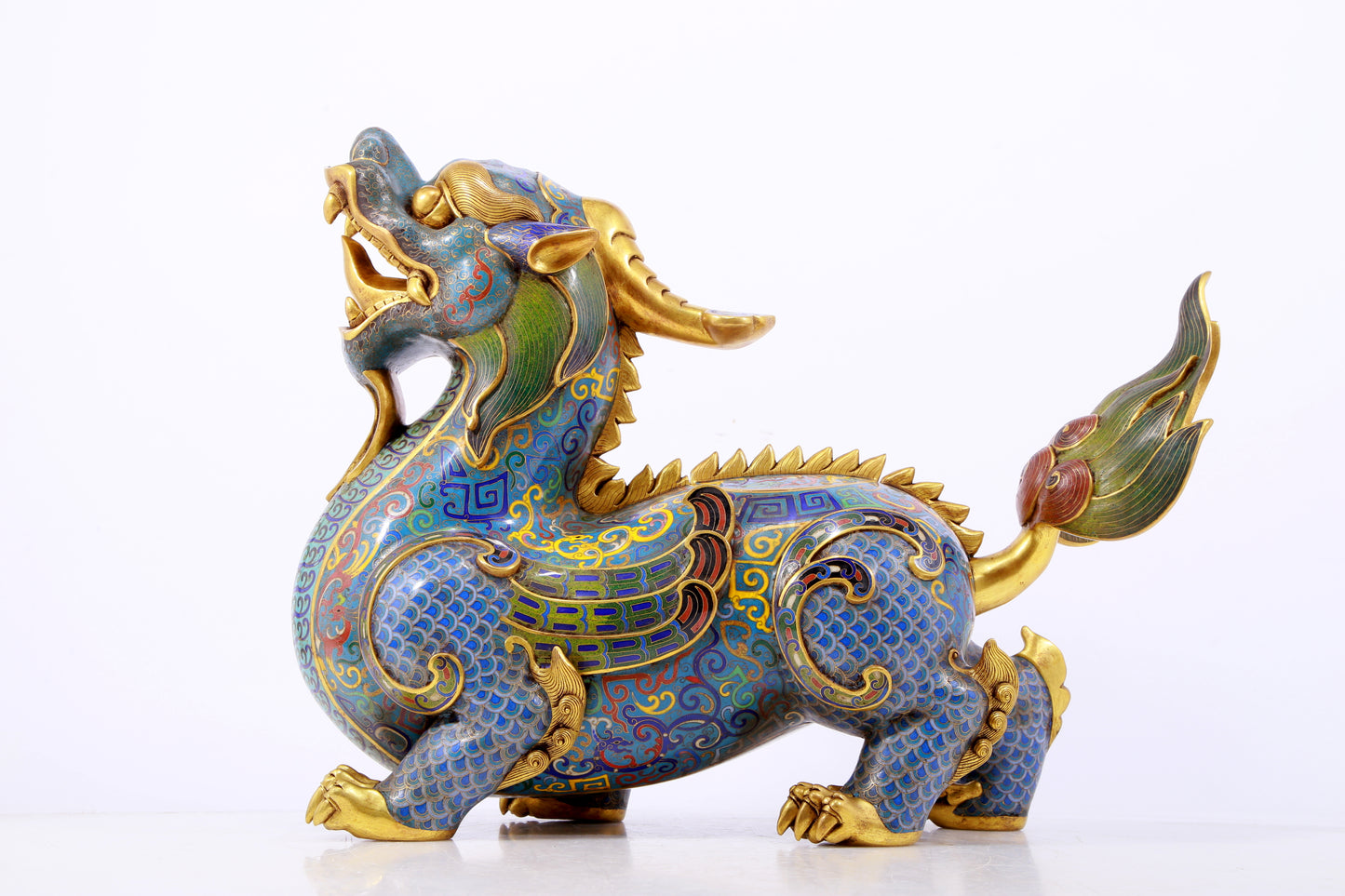 A pair of precious cloisonné unicorn ornaments