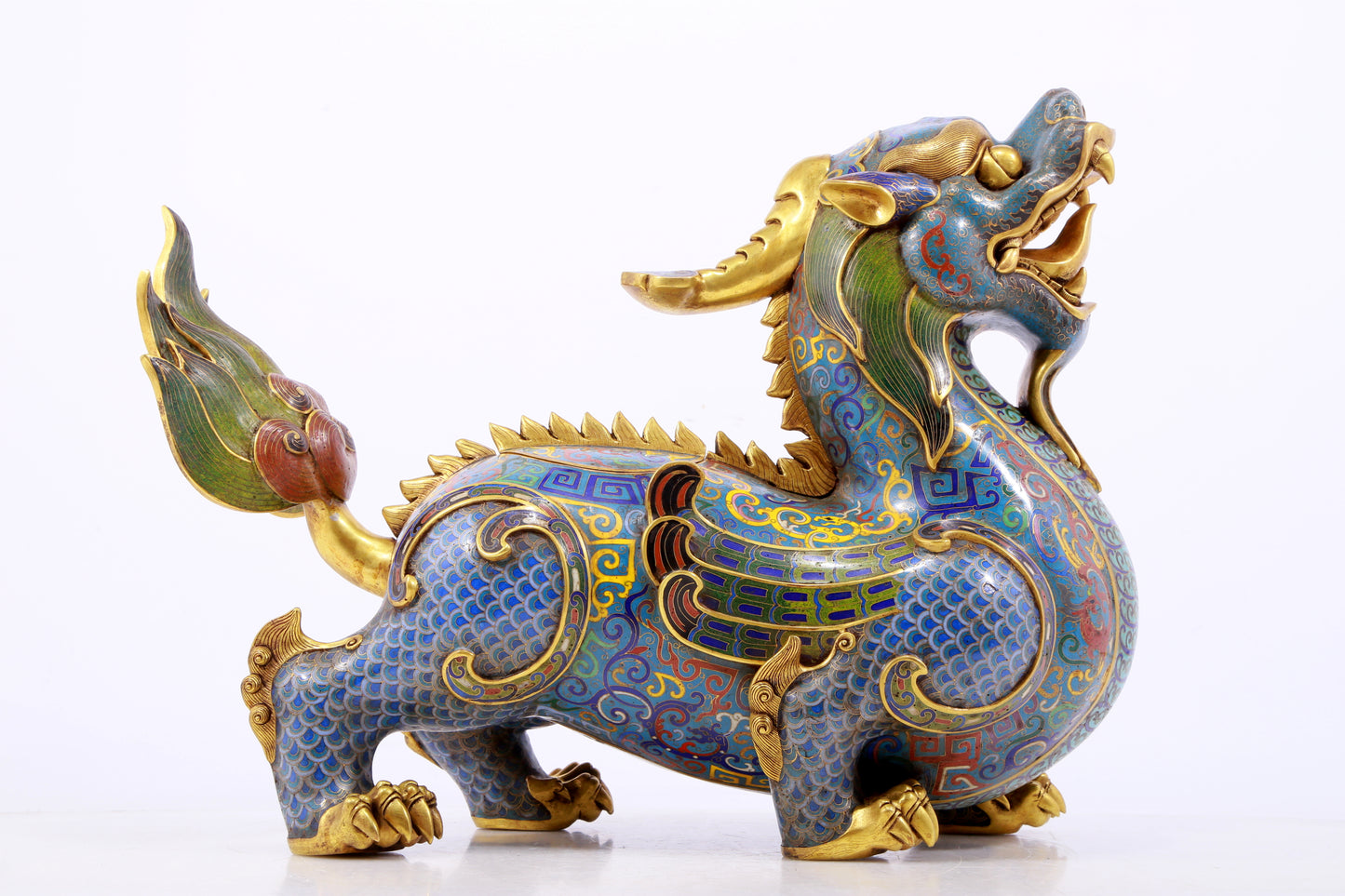 A pair of precious cloisonné unicorn ornaments