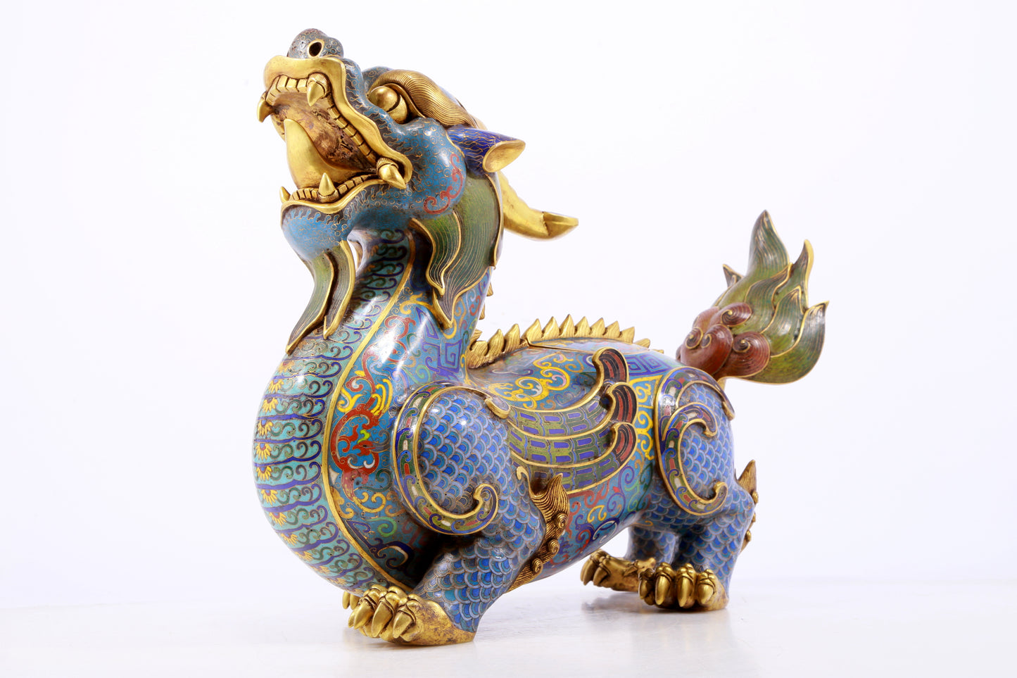 A pair of precious cloisonné unicorn ornaments