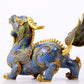 A pair of precious cloisonné unicorn ornaments