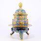 A perfect cloisonné 'Lotus and Eight dharma-vessel' pattern tripod censer