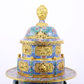 A perfect cloisonné 'Lotus and Eight dharma-vessel' pattern tripod censer