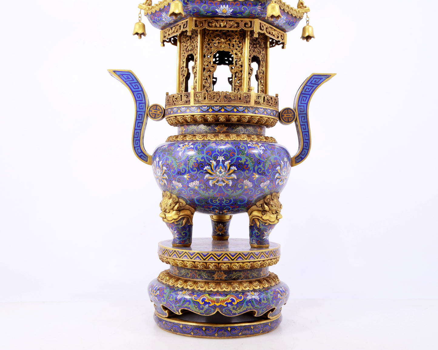 A stunning pair of cloisonné double-eared and tripod censers with twining lotus patterns