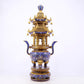 A stunning pair of cloisonné double-eared and tripod censers with twining lotus patterns