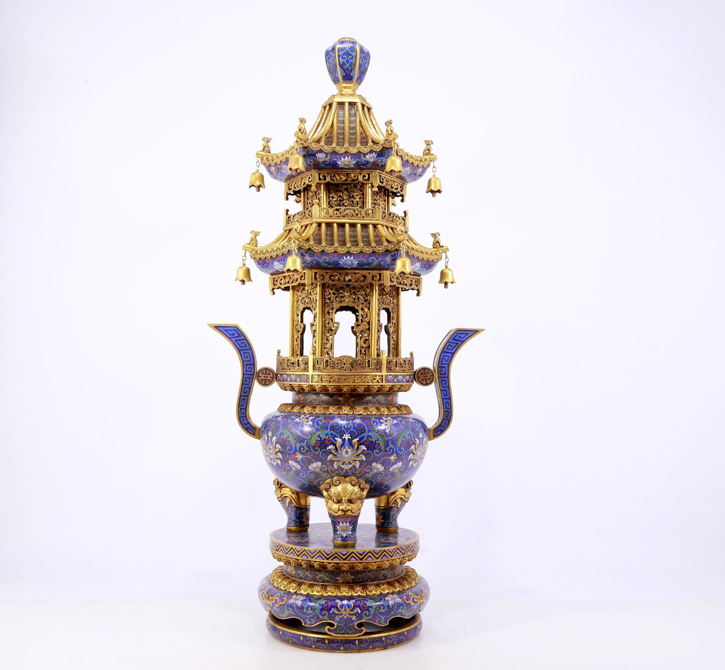 A stunning pair of cloisonné double-eared and tripod censers with twining lotus patterns