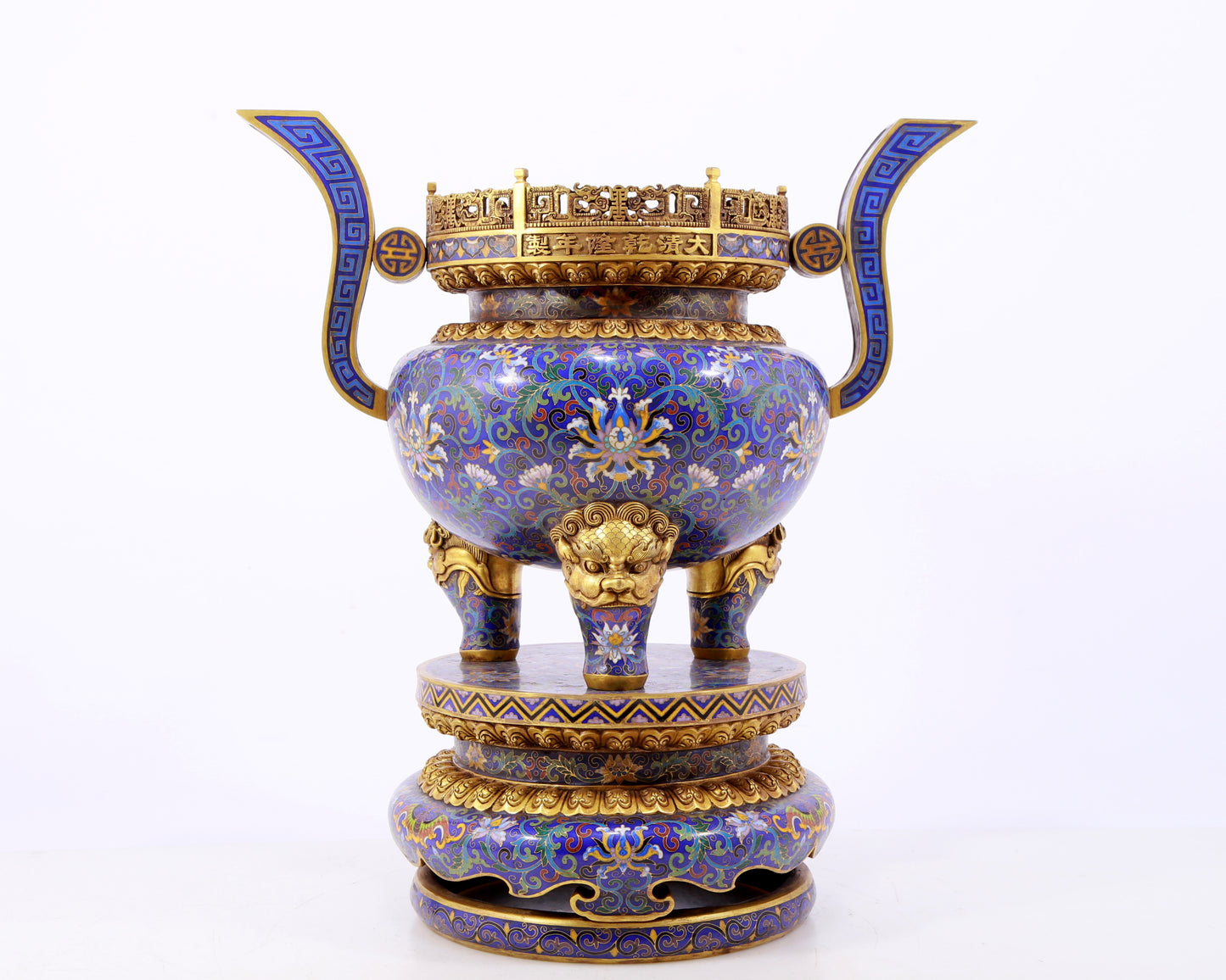 A stunning pair of cloisonné double-eared and tripod censers with twining lotus patterns