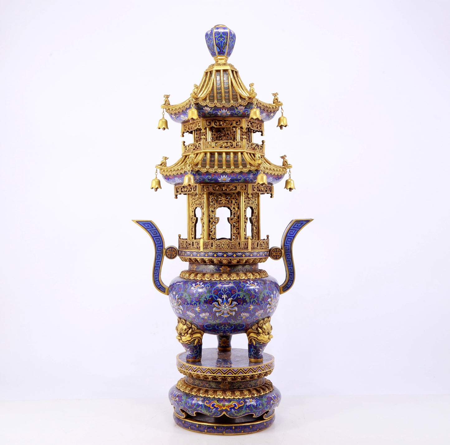 A stunning pair of cloisonné double-eared and tripod censers with twining lotus patterns