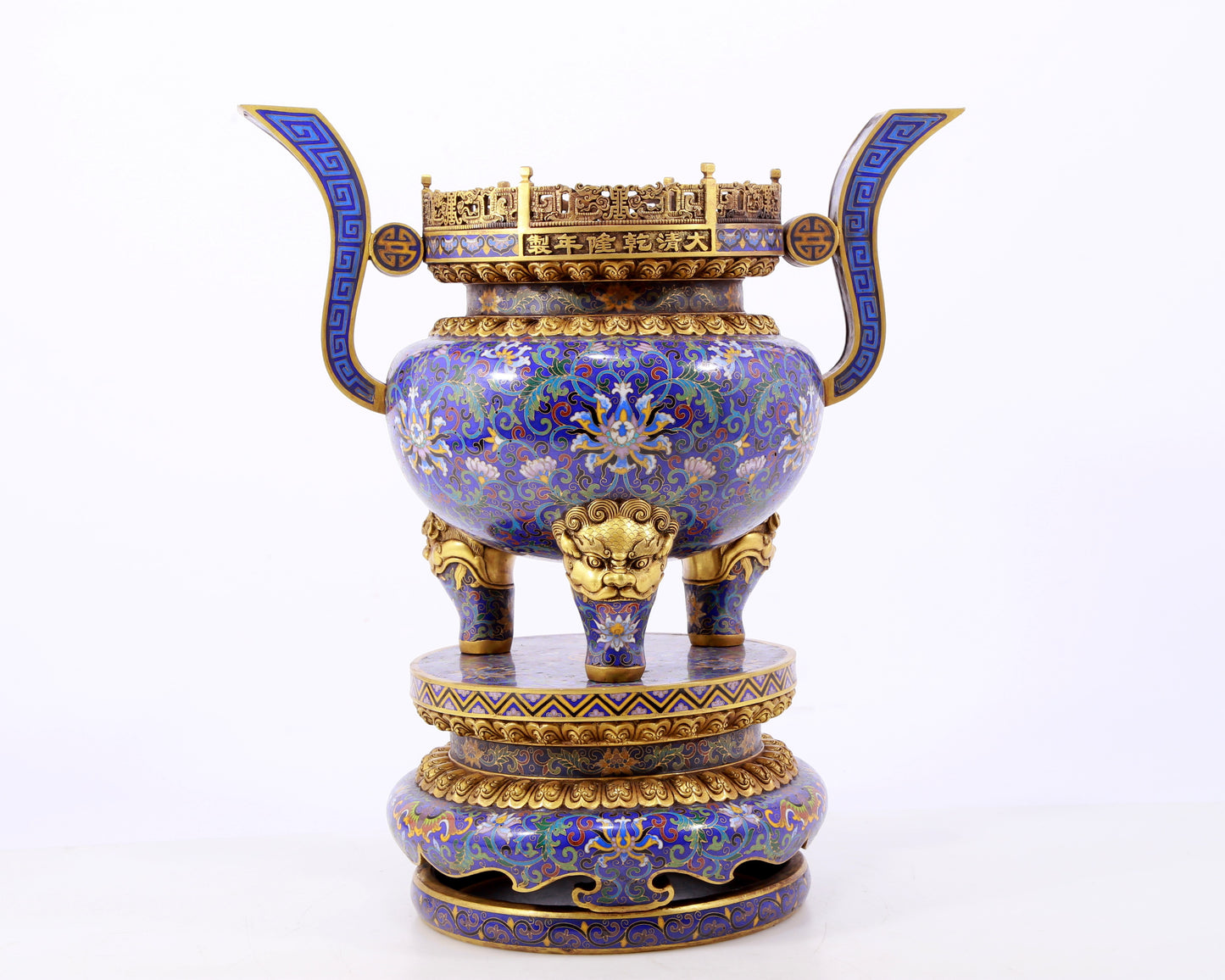 A stunning pair of cloisonné double-eared and tripod censers with twining lotus patterns