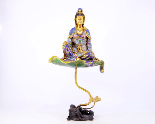 A serene cloisonné statue of Guanyin